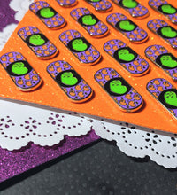 Load image into Gallery viewer, Halloween bandaid enamel pin
