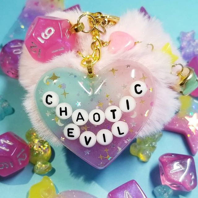 Chaotic Evil D&D Pink Puff Keychain with Die