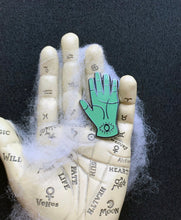 Load image into Gallery viewer, Palm Reading Hard Enamel Pin 1.5&quot; With Glow-in-the-Dark green enamel and Black Nickel perfect for those into occult &amp; Halloween
