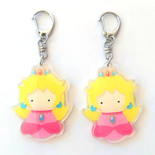 Load image into Gallery viewer, Princess + 2 Bros - 2.5&quot; Kokeshi Matryoshka Acrylic Keychain Charm
