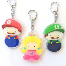 Load image into Gallery viewer, Princess + 2 Bros - 2.5&quot; Kokeshi Matryoshka Acrylic Keychain Charm
