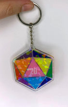 Load image into Gallery viewer, Queer Pride Dice Keychain Charm: Holographic Acrylic Keychain Charm Expressing LGBTQIA+ pride for ttrpg gaymers of all types, ita bags 2&quot;
