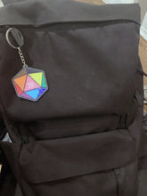 Load image into Gallery viewer, Queer Pride Dice Keychain Charm: Holographic Acrylic Keychain Charm Expressing LGBTQIA+ pride for ttrpg gaymers of all types, ita bags 2&quot;
