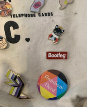 Load image into Gallery viewer, Rainbow Nerd Button: 2.25&quot; Pinback Button Badge to get you ready for Pride Month and show off your Dungeons and Dragons pride.
