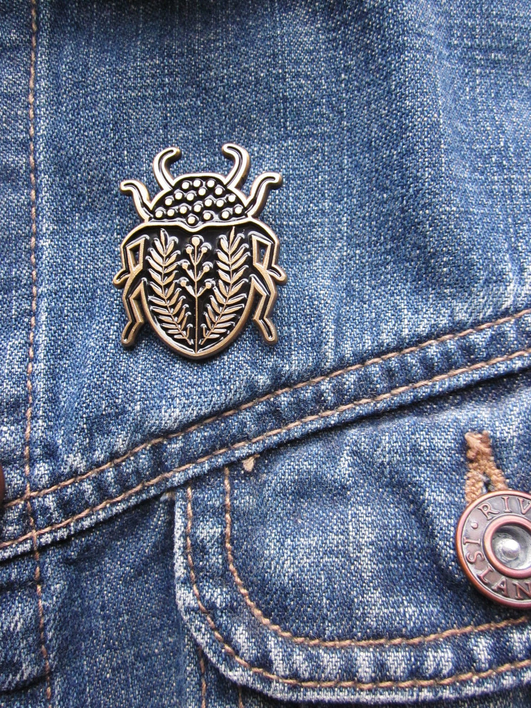 Enamel pin brooch, beetle design, black and gold metal