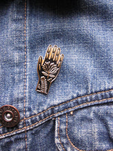 Load image into Gallery viewer, Enamel pin brooch, tattoo hand design, black and gold metal
