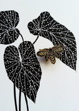 Load image into Gallery viewer, Enamel pin brooch, moth design, black and gold metal

