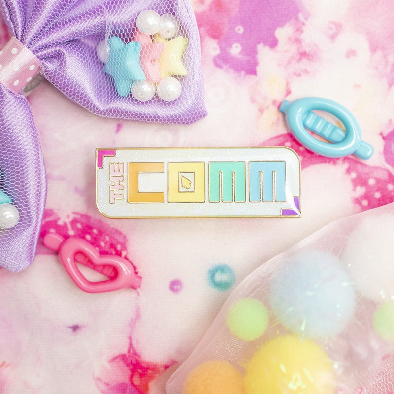 THE COMM LOGO PIN