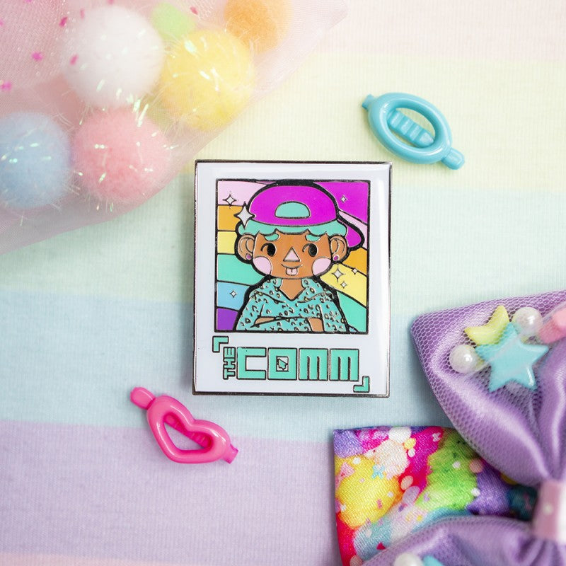 THE COMM POLAROID PIN (PINK OR TEAL)